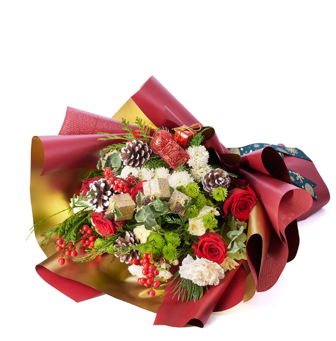 With a mix of white and red roses adorned with gold holiday-themed ornaments and wrapped in a festive bow, this bouquet is a wonderful way to wish someone a Merry Christmas.