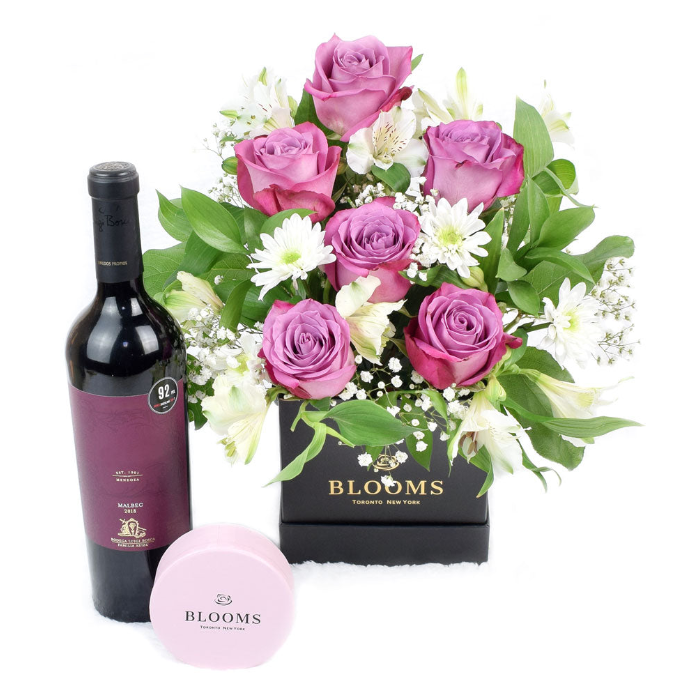 This stunning gift set features a combination of roses and alstroemeria, along with a box of assorted chocolates.