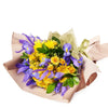 Luminous Lavender Iris Bouquet harmonizes the vibrant yellow of the sun with the soothing lavender tones of irises, creating a versatile flower gift suitable for any occasion. New York Blooms