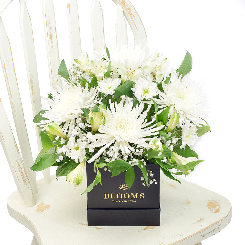 Peaceful White Mixed Floral Arrangement from New York Blooms - Floral Gift Hat Box - New York Delivery.